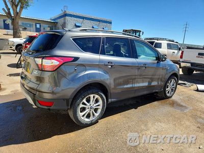 Trzecie zdjęcie samochodu z tyłu: 2018 FORD ESCAPE SE VIN:1FMCU9GD0JUC87506 - miniatura