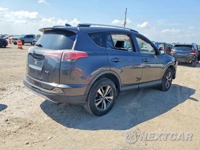 Trzecie zdjęcie samochodu z tyłu: 2018 TOYOTA RAV4 XLE VIN:JTMWFREV0JJ752097 - miniatura