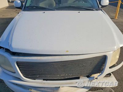 Zdjęcie 11 z 12 samochodu: 2000 FORD F150 VIN:1FTRX07W1YKA80227 - miniatura
