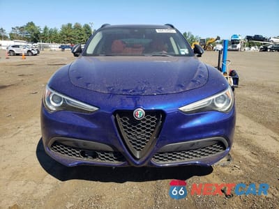 Piąte zdjęcie samochodu w środku: 2021 ALFA ROMEO STELVIO TI VIN:ZASPAKBN5M7D20936 - miniatura