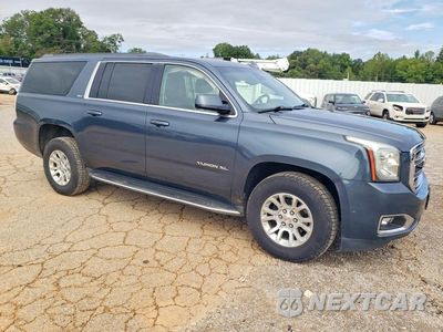 Czwarte zdjęcie samochodu z boku: 2019 GMC YUKON XL K1500 SLT VIN:1GKS2GKC4KR392132 - miniatura