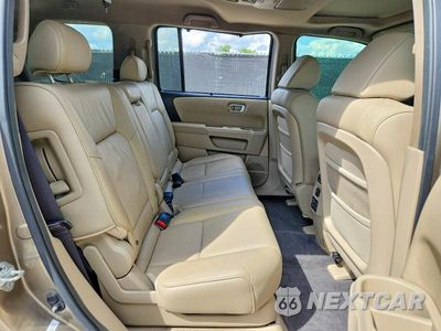 Zdjęcie 11 z 13 samochodu: 2011 HONDA PILOT TOURING VIN:5FNYF3H9XBB043058 - miniatura