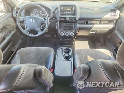 Zdjęcie 8 z 13 samochodu: 2004 HONDA CR-V EX VIN:JHLRD78864C048785 - miniatura