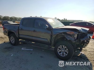 Czwarte zdjęcie samochodu z boku: 2019 TOYOTA TACOMA SR5 V6 VIN:3TMAZ5CN1KM093156 - miniatura