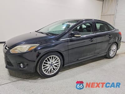 2014 FORD FOCUS TITANIUM 1FADP3J29EL104156 - główne zdjęcie licytacji z USA - miniatura