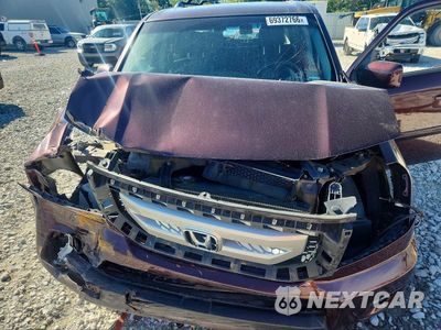 Zdjęcie 12 z 13 samochodu: 2011 HONDA PILOT EXL VIN:5FNYF4H51BB071611 - miniatura