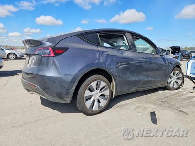 Trzecie zdjęcie samochodu z tyłu: 2023 TESLA MODEL Y VIN:7SAYGDEE4PA129378 - miniatura