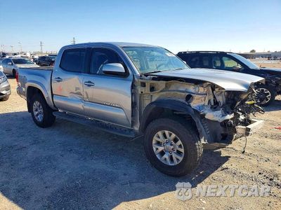 Czwarte zdjęcie samochodu z boku: 2017 TOYOTA TACOMA SR5 V6 VIN:5TFAZ5CN2HX040291 - miniatura