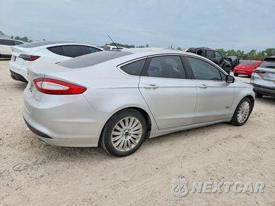 Trzecie zdjęcie samochodu z tyłu: 2015 FORD FUSION SE PHEV VIN:3FA6P0PUXFR181718 - miniatura