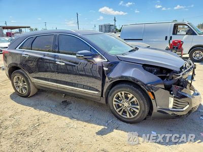 Czwarte zdjęcie samochodu z boku: 2021 CADILLAC XT5 LUXURY VIN:1GYKNAR42MZ161564 - miniatura