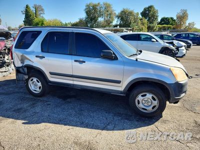 Czwarte zdjęcie samochodu z boku: 2003 HONDA CR-V LX VIN:JHLRD68583C018248 - miniatura