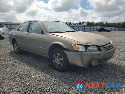 Czwarte zdjęcie samochodu z boku: 1999 TOYOTA CAMRY LE VIN:JT2BG22KXX0298283 - miniatura