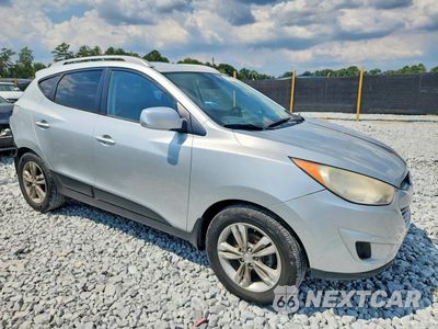 Czwarte zdjęcie samochodu z boku: 2011 HYUNDAI TUCSON GLS VIN:KM8JU3AC7BU300659 - miniatura