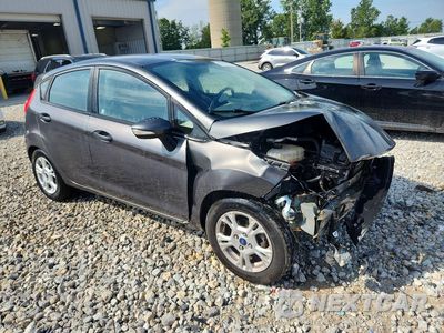 Czwarte zdjęcie samochodu z boku: 2015 FORD FIESTA SE VIN:3FADP4EJ1FM145534 - miniatura