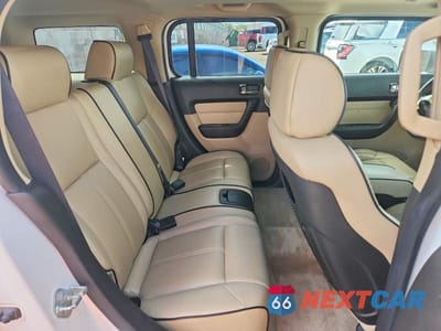 Zdjęcie 11 z 13 samochodu: 2006 HUMMER H3 VIN:5GTDN136968232852 - miniatura