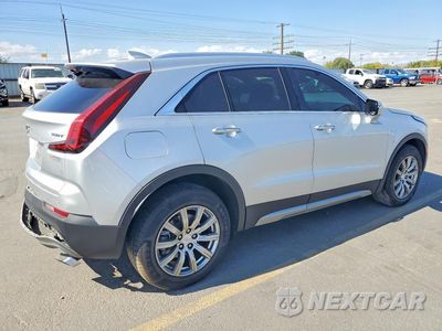 Trzecie zdjęcie samochodu z tyłu: 2022 CADILLAC XT4 PREMIUM LUXURY VIN:1GYFZDR48NF102240 - miniatura