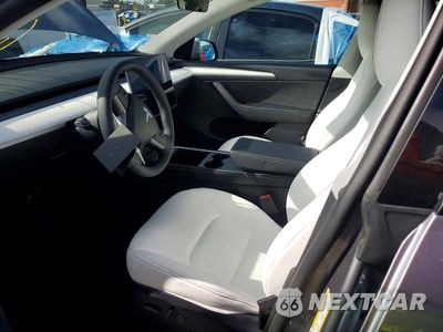 Zdjęcie 7 z 13 samochodu: 2024 TESLA MODEL Y VIN:7SAYGDED1RA313347 - miniatura