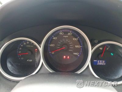 Zdjęcie 9 z 12 samochodu: 2007 HONDA FIT VIN:JHMGD38457S003596 - miniatura