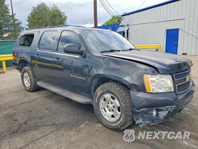Czwarte zdjęcie samochodu z boku: 2012 CHEVROLET SUBURBAN K1500 LT VIN:1GNSKJE78CR100403 - miniatura