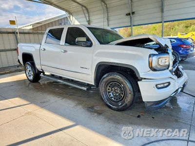 Czwarte zdjęcie samochodu z boku: 2018 GMC SIERRA K1500 DENALI VIN:3GTU2PEJ9JG132838 - miniatura