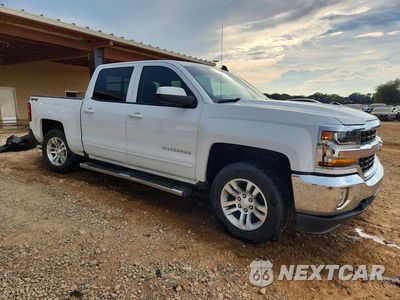 Czwarte zdjęcie samochodu z boku: 2018 CHEVROLET SILVERADO K1500 LT VIN:3GCUKREC3JG575578 - miniatura