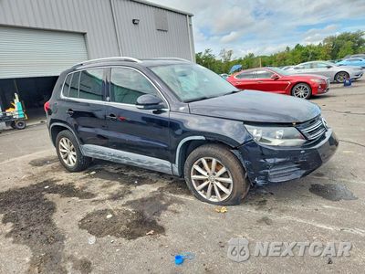 Czwarte zdjęcie samochodu z boku: 2017 VOLKSWAGEN TIGUAN WOLFSBURG VIN:WVGRV7AX6HW506188 - miniatura