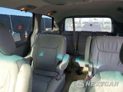 Zdjęcie 10 z 13 samochodu: 2010 TOYOTA SIENNA XLE VIN:5TDYK4CC5AS318138 - miniatura