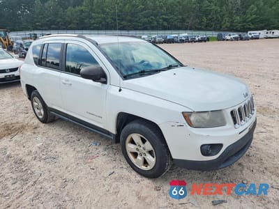 Czwarte zdjęcie samochodu z boku: 2014 JEEP COMPASS SPORT VIN:1C4NJCBA7ED743006 - miniatura