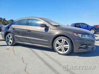 Czwarte zdjęcie samochodu z boku: 2014 VOLKSWAGEN CC SPORT VIN:WVWBP7AN9EE535748 - miniatura