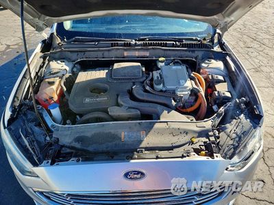 Zdjęcie 11 z 12 samochodu: 2018 FORD FUSION SE HYBRID VIN:3FA6P0LU7JR197230 - miniatura