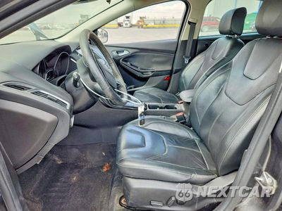 Zdjęcie 7 z 13 samochodu: 2017 FORD FOCUS TITANIUM VIN:1FADP3N26HL349219 - miniatura