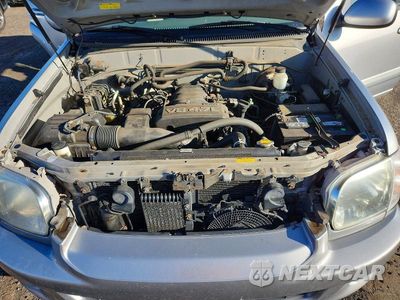 Zdjęcie 12 z 13 samochodu: 2005 TOYOTA SEQUOIA VIN:5TDBT44A05S255911 - miniatura