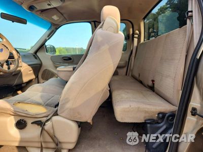 Zdjęcie 10 z 12 samochodu: 2003 FORD F-150 VIN:1FTRX17W33NB42823 - miniatura