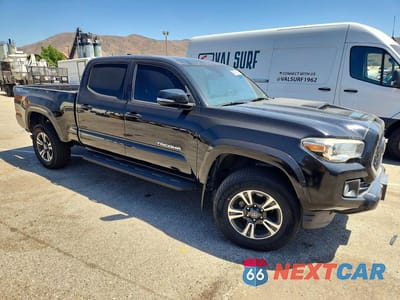 Czwarte zdjęcie samochodu z boku: 2018 TOYOTA TACOMA TRD SPORT VIN:3TMBZ5DN1JM013484 - miniatura