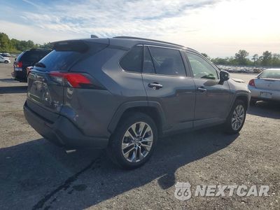 Trzecie zdjęcie samochodu z tyłu: 2021 TOYOTA RAV4 XLE PREMIUM VIN:JTMA1RFV9MD082981 - miniatura
