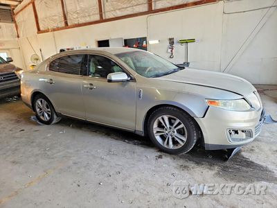Czwarte zdjęcie samochodu z boku: 2011 LINCOLN MKS VIN:1LNHL9DR7BG604559 - miniatura