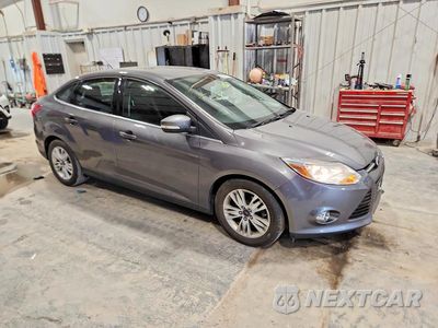 Czwarte zdjęcie samochodu z boku: 2012 FORD FOCUS SEL VIN:1FAHP3H20CL360920 - miniatura