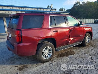 Trzecie zdjęcie samochodu z tyłu: 2019 CHEVROLET TAHOE K1500 LT VIN:1GNSKBKC6KR365701 - miniatura