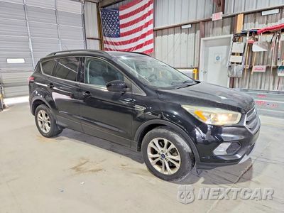 Czwarte zdjęcie samochodu z boku: 2017 FORD ESCAPE SE VIN:1FMCU9GD1HUC09634 - miniatura