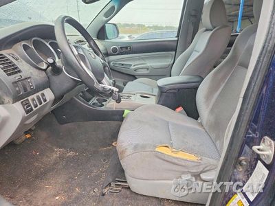 Zdjęcie 7 z 12 samochodu: 2012 TOYOTA TACOMA V6 VIN:3TMLU4EN7CM089760 - miniatura