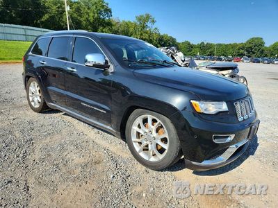 Czwarte zdjęcie samochodu z boku: 2015 JEEP GRAND CHEROKEE SUMMIT VIN:1C4RJFJG5FC754909 - miniatura