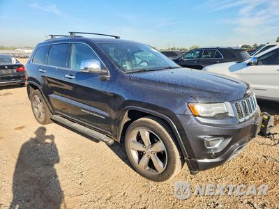 Czwarte zdjęcie samochodu z boku: 2014 JEEP GRAND CHEROKEE OVERLAND VIN:1C4RJFCG2EC132246 - miniatura