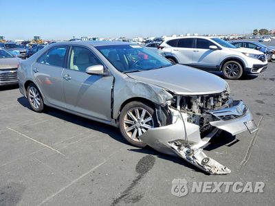 Czwarte zdjęcie samochodu z boku: 2014 TOYOTA CAMRY XLE VIN:4T4BF1FK2ER401752 - miniatura