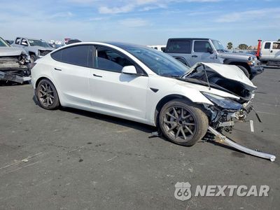 Czwarte zdjęcie samochodu z boku: 2023 TESLA MODEL 3 VIN:5YJ3E1EA6PF454593 - miniatura