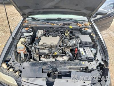 Zdjęcie 11 z 12 samochodu: 2003 CHEVROLET MALIBU LS VIN:1G1NE52J73M733288 - miniatura