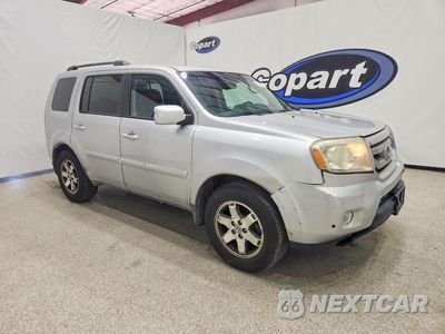 Czwarte zdjęcie samochodu z boku: 2011 HONDA PILOT TOURING VIN:5FNYF3H94BB045064 - miniatura