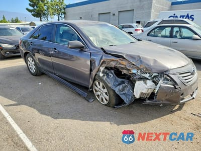 Czwarte zdjęcie samochodu z boku: 2009 TOYOTA CAMRY HYBRID VIN:JTNBB46KX93050379 - miniatura