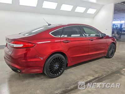Trzecie zdjęcie samochodu z tyłu: 2017 FORD FUSION SE VIN:3FA6P0T91HR342848 - miniatura