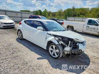 Czwarte zdjęcie samochodu z boku: 2014 HYUNDAI VELOSTER BASE VIN:KMHTC6AD9EU188800 - miniatura