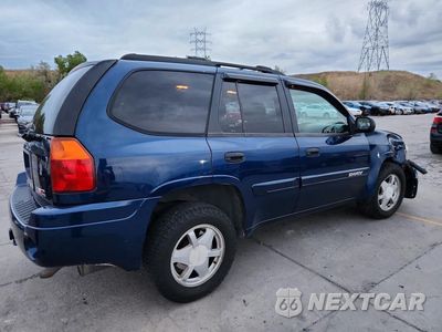 Trzecie zdjęcie samochodu z tyłu: 2002 GMC ENVOY VIN:1GKDT13S322171705 - miniatura